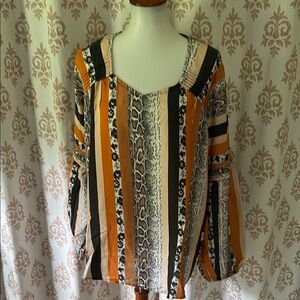 Tolani striking roomy fit animal print striped tunic M